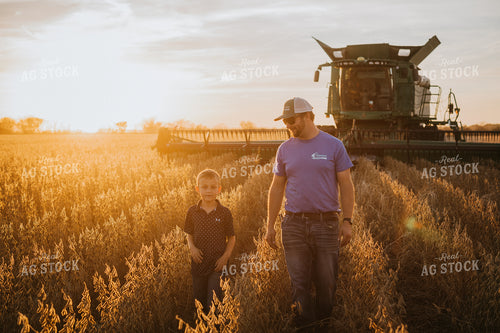 Farmer and Son in Soybean Field 6979