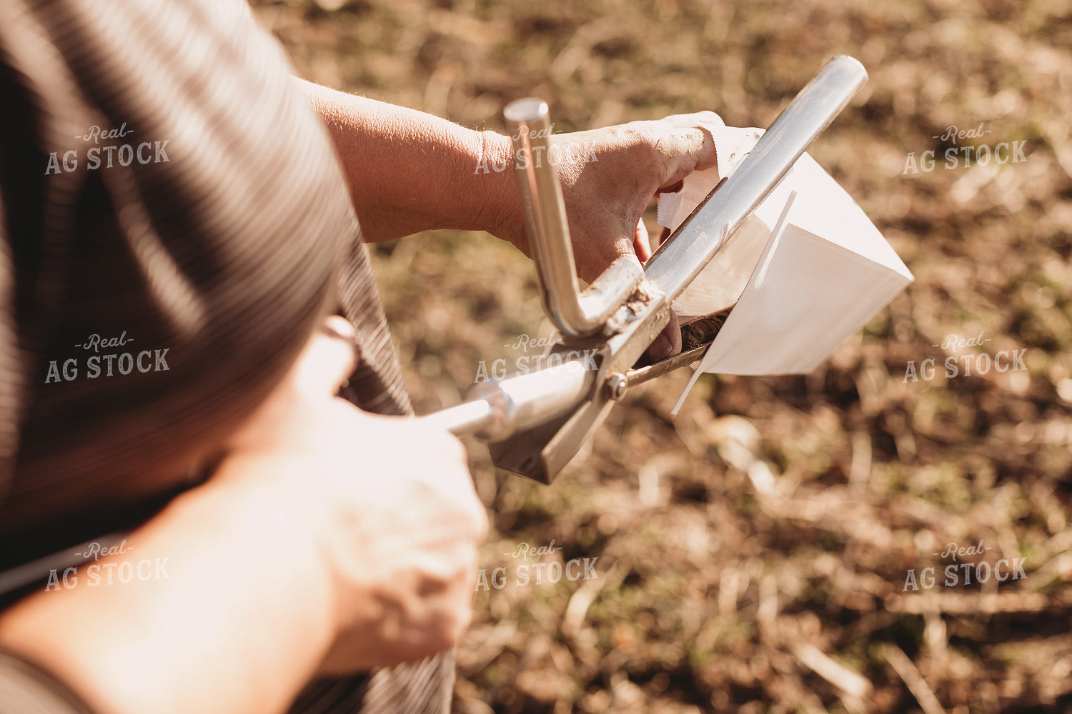 Farmer Putting Soil Core in Soil Sample Bag 3719
