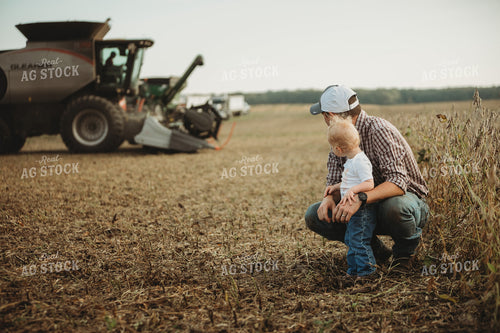 Farmer and Farm Kid Watching Combine 4820