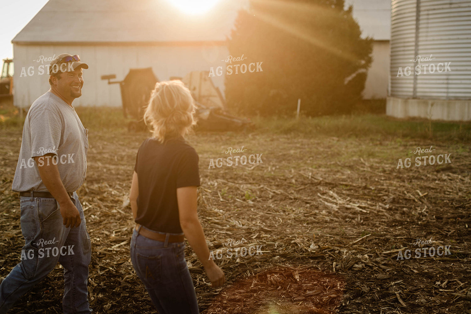 Farmer and Agronomist Talking in Field 8300
