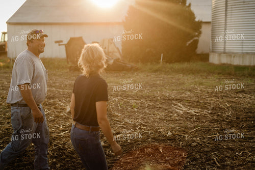 Farmer and Agronomist Talking in Field 8300