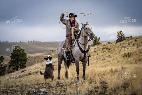 Cowgirl on Horseback with Dog 290031