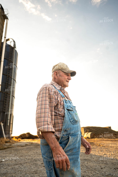 Farmer Walking by Shed 115903