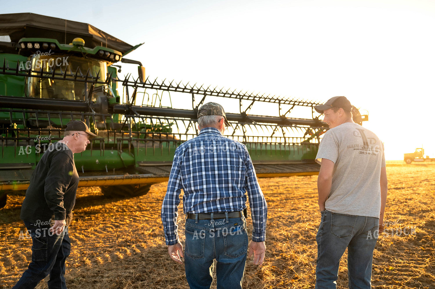 Farmers Walking by Combine 115592