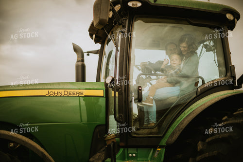 Farm Family in Tractor  6662