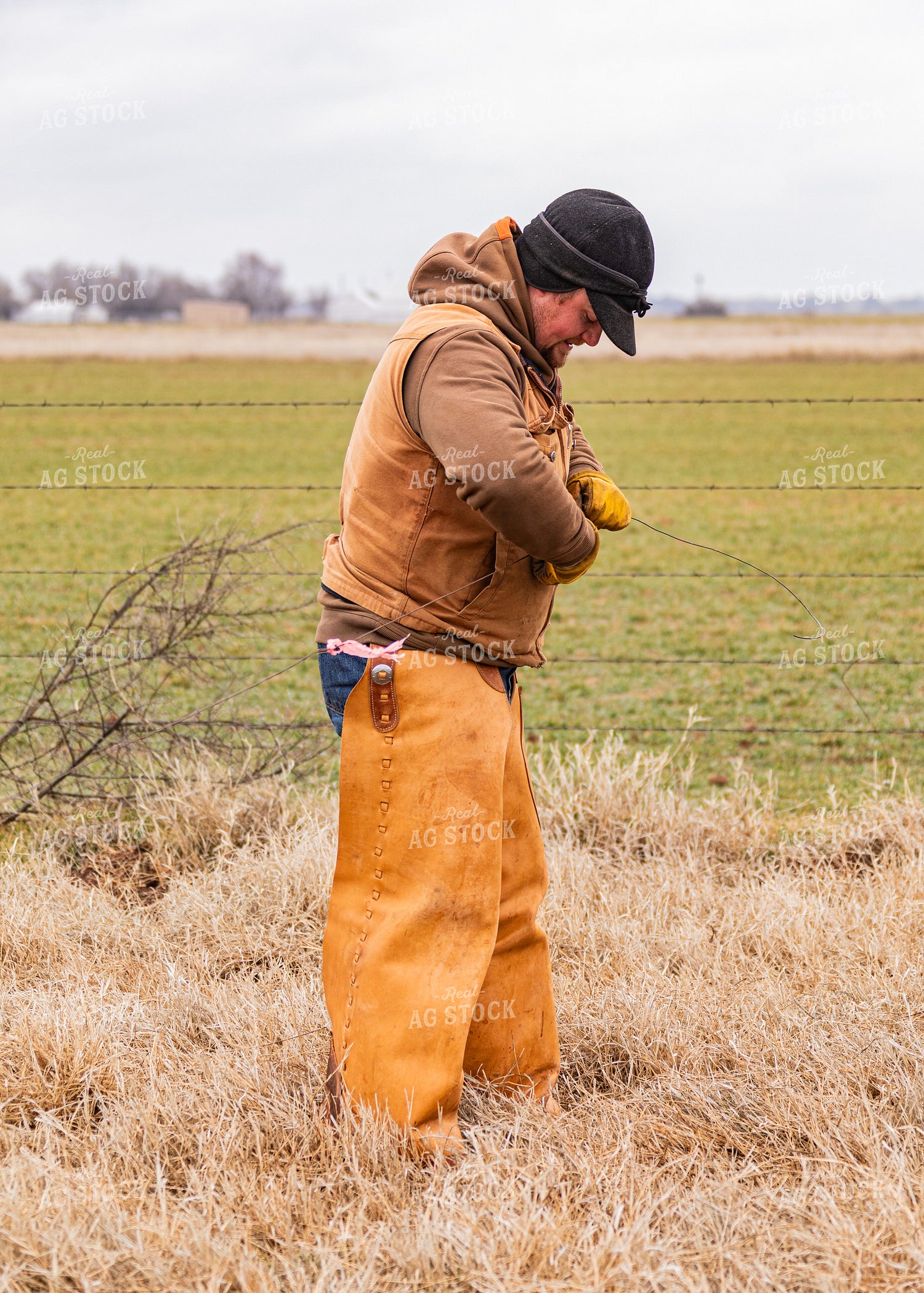 Rancher Fixing Fence 231070