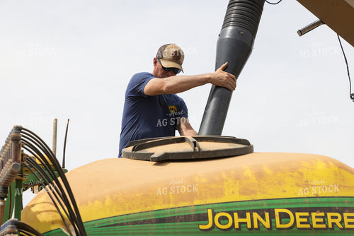 Farmer Filling Planter 79868