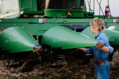 Female Farmer by Fixing Combine Head 8390