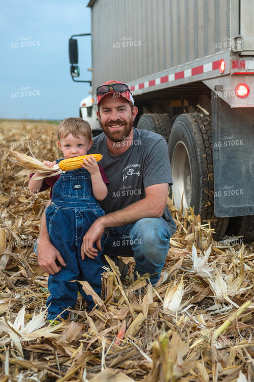 Farmer and Son in Field 129064