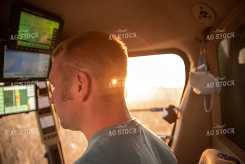 Farmer Driving Combine 76363