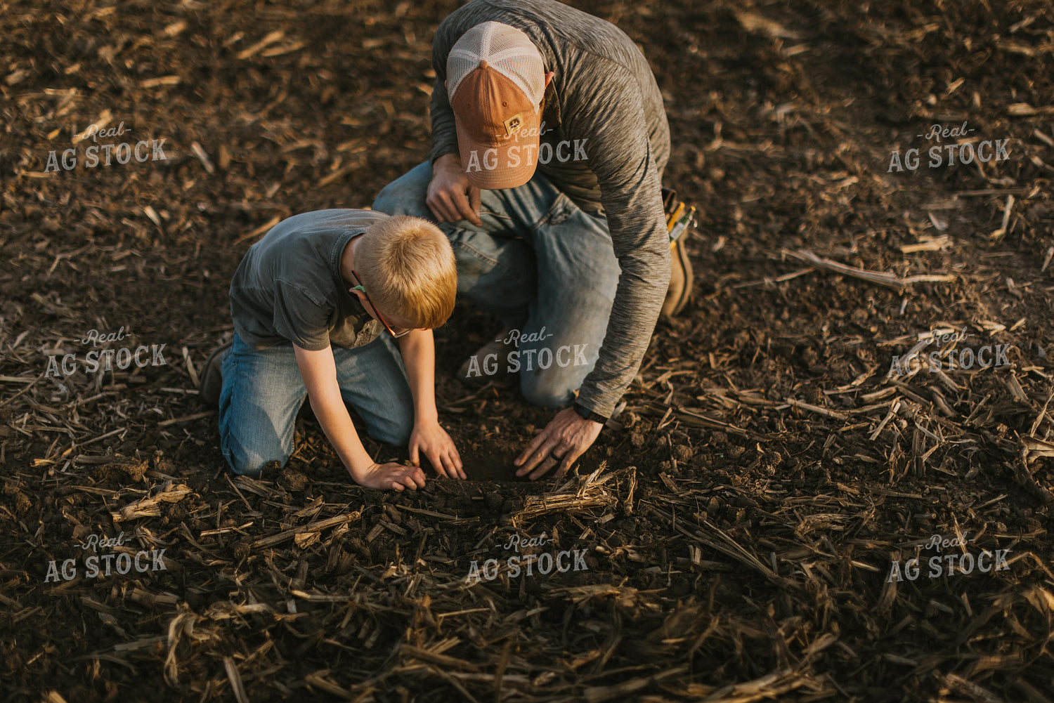 Farmer Checking Seed Depth with Son 8221