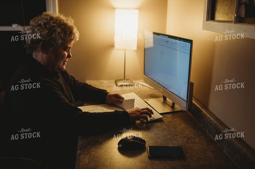 Farmer Using Computer for Farm Accounting 3708