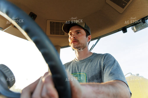 Farmer Operating Tractor 52630