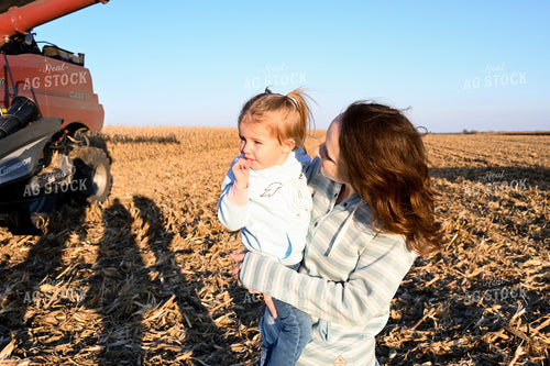 Farm Wife and Kid in Field 26320