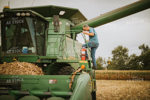 Farmer Getting in Combine 6623