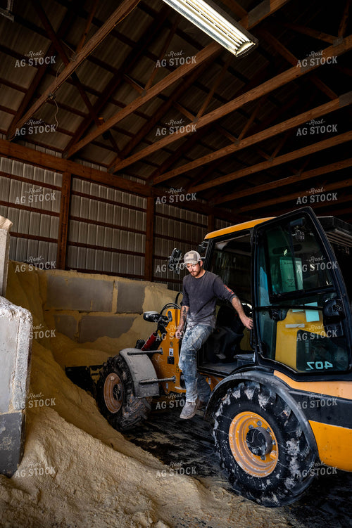 Farmer Getting out of Loader 115534