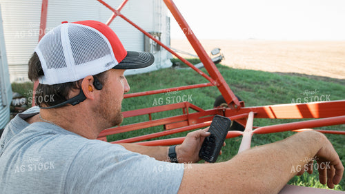 Farmer Using Phone 26086