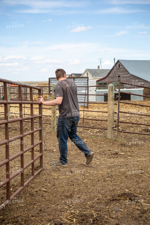 Farmer Opening Gate 155414