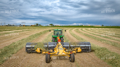 Tractor with Merger in Hay Field 56410