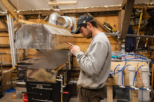 Farmer Cooking Maple Syrup 52810