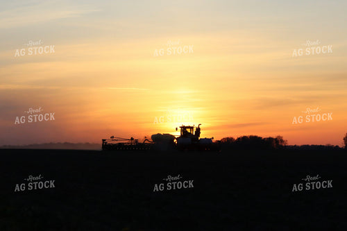Tractor in Field at Sunset 109080