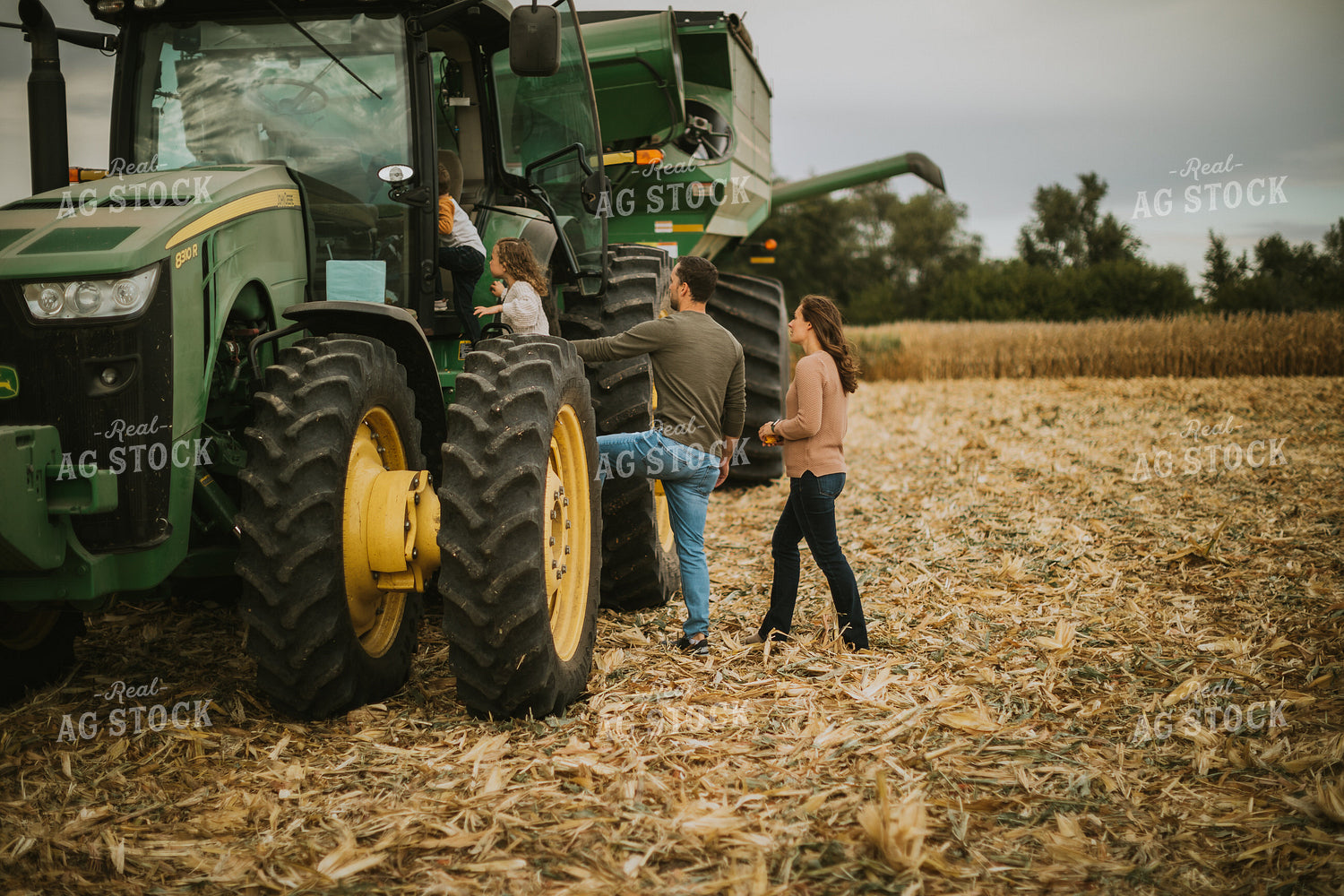Farm Family Getting in Tractor 6627