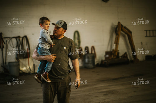 Farmer with Farm Kid in Shop 5134