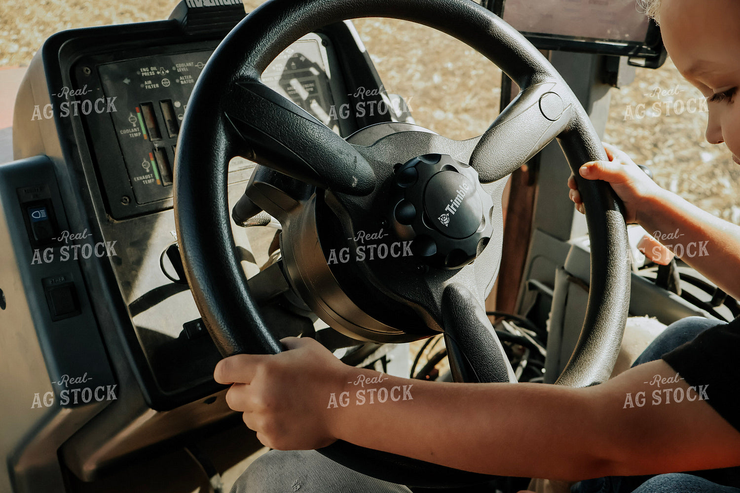 Farm Kid Driving Tractor on Lap 289008