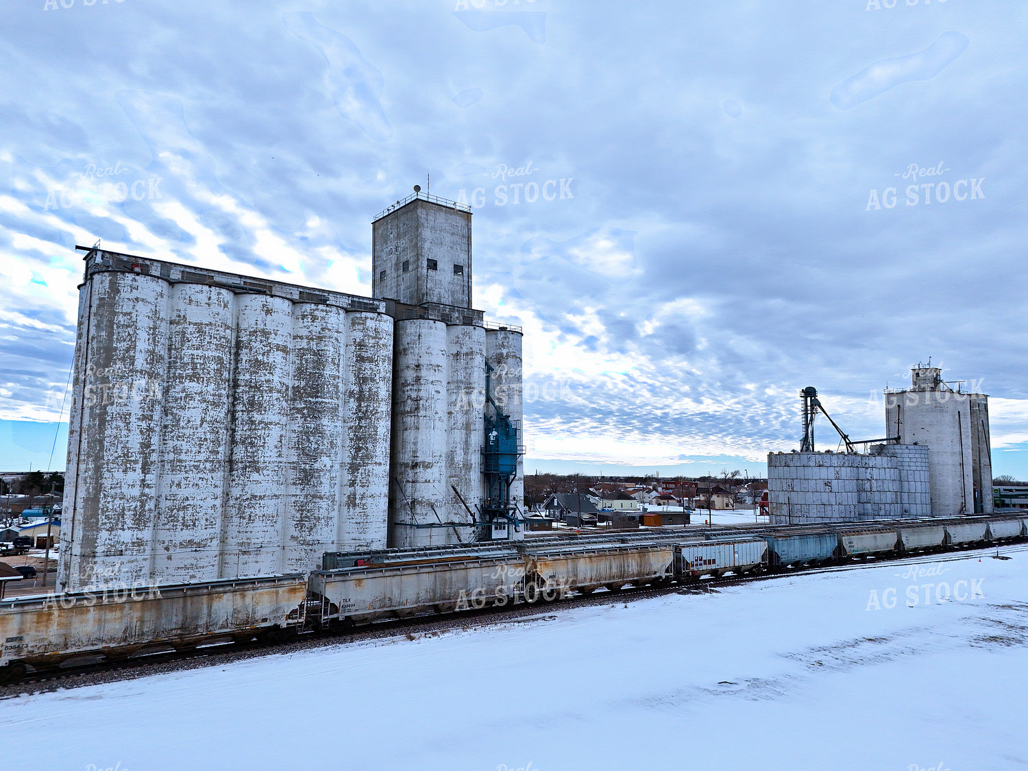 Grain Terminal Alongside Train Tracks 239132