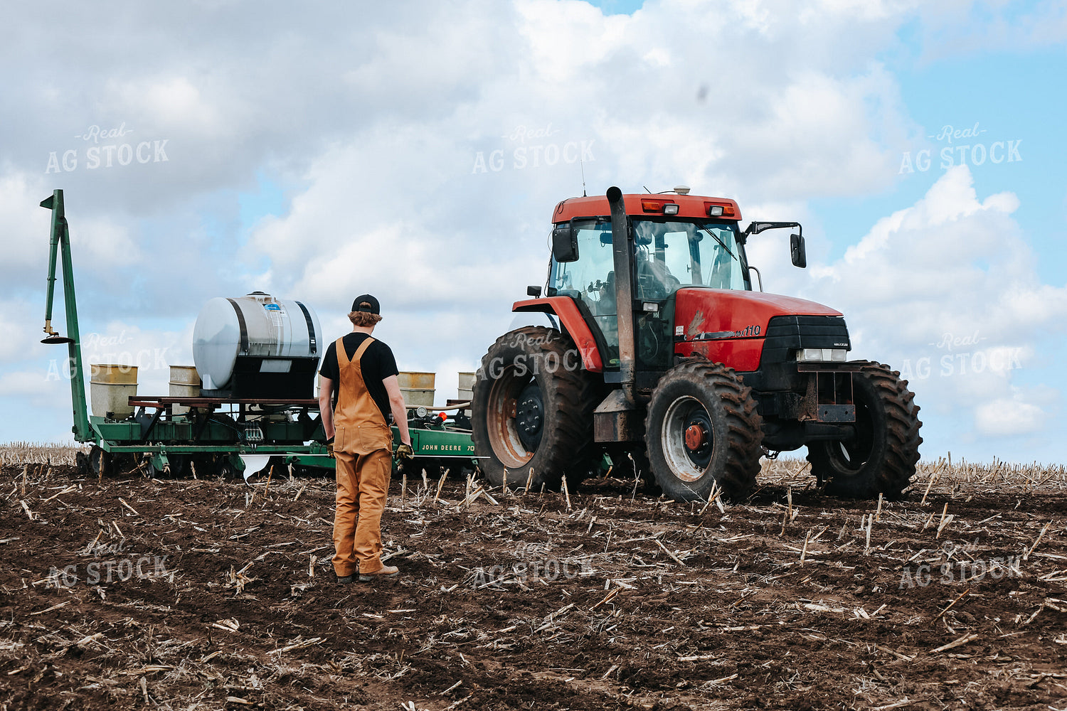 Farmer Standing by Planter 187031