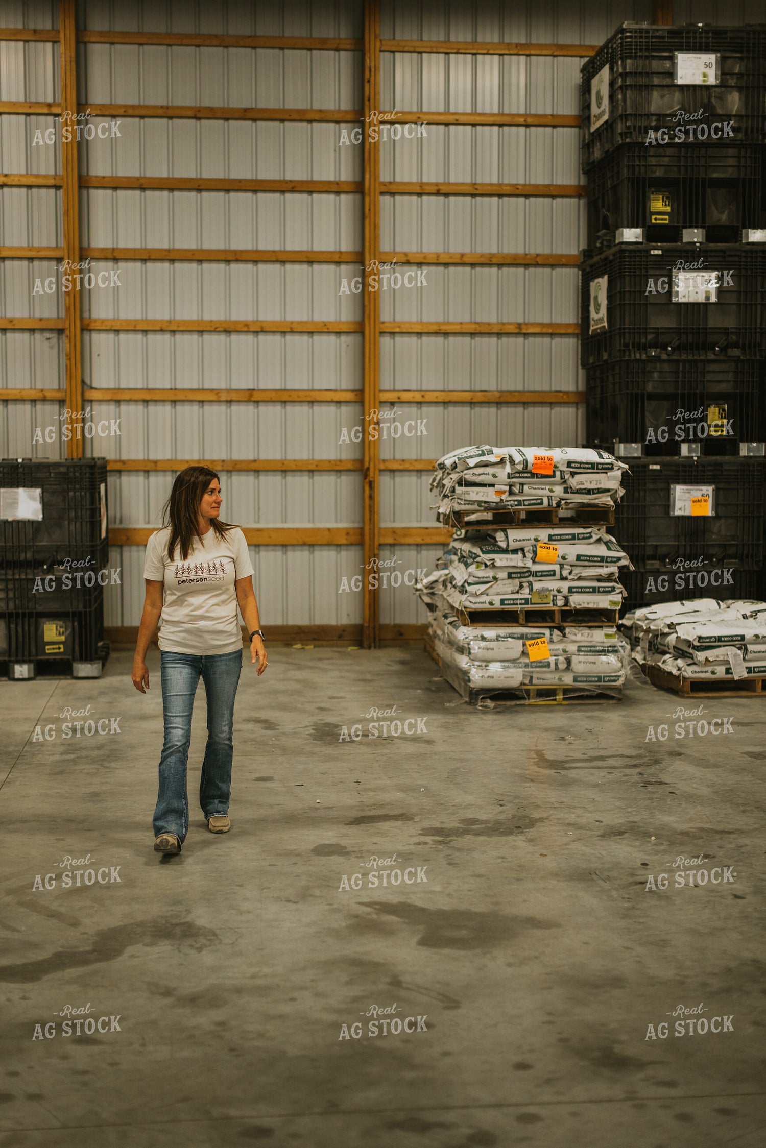 Woman Farmers Walks in Seed Shed 7629