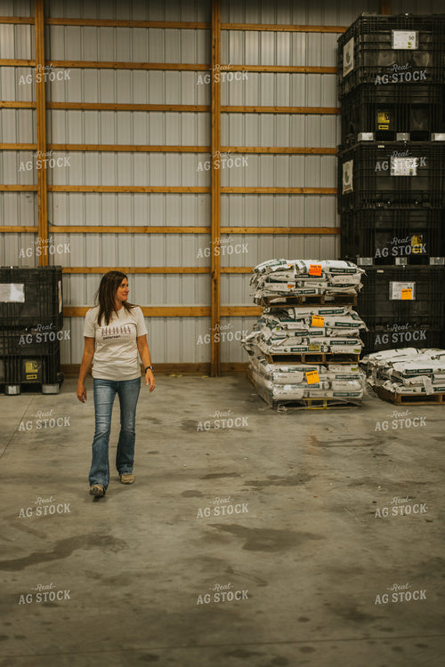 Woman Farmers Walks in Seed Shed 7629