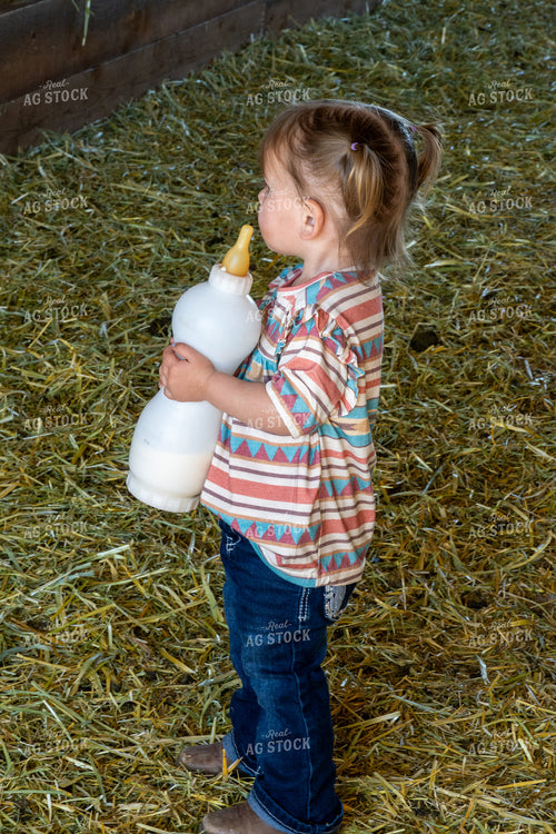 Farm Kid Holding Bottle 65171