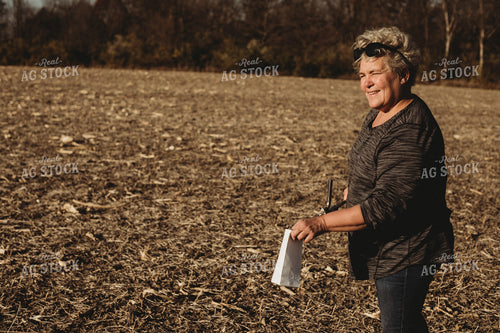 Farmer Putting Soil Core in Soil Sample Bag 3734