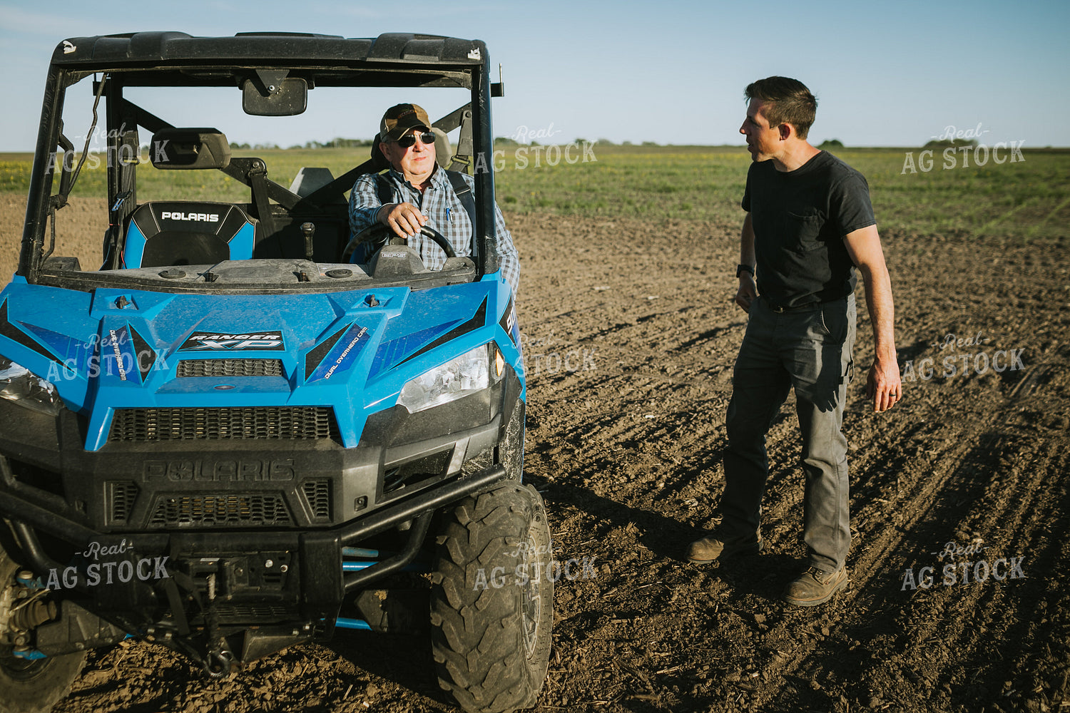 Farmers in Field with UTV 4254