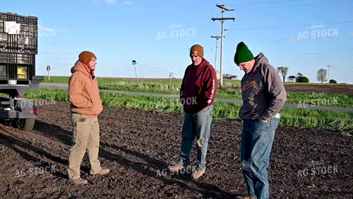 Multigeneration Farm Family Talking in the Field - 037