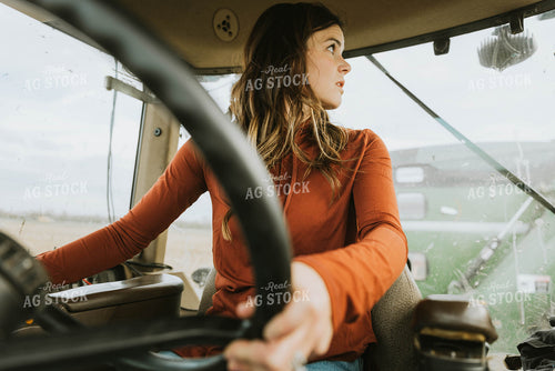 Female Farmer Driving Tractor 8549