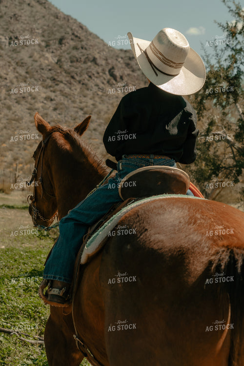 Ranch Kid on Horseback 58299