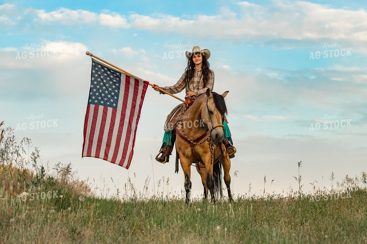 Female Rancher on Horseback with American Flag 188094