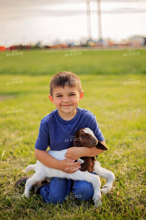 Farm Kid Holding Goat 93146