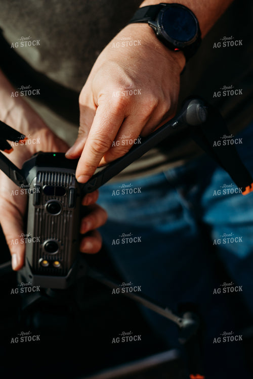 Farmer Holding Drone 196325