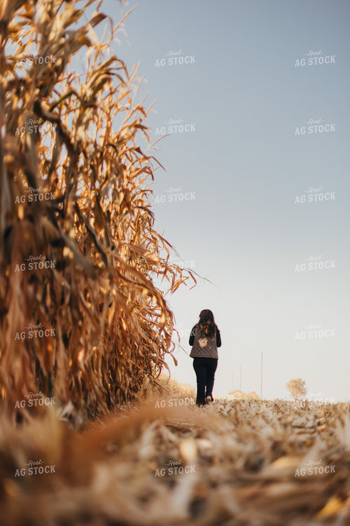 Female Appraiser Valuating Land 9450