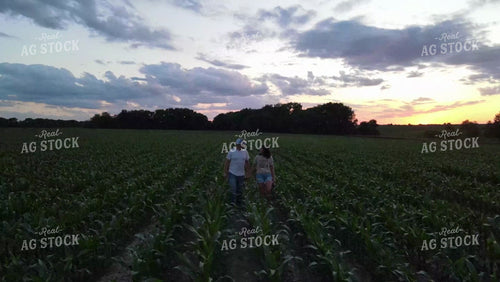 Farmer & Farm Wife Checking Corn 9166