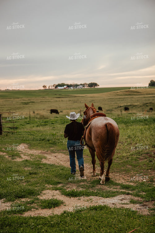 Female Rancher on Horseback 67799