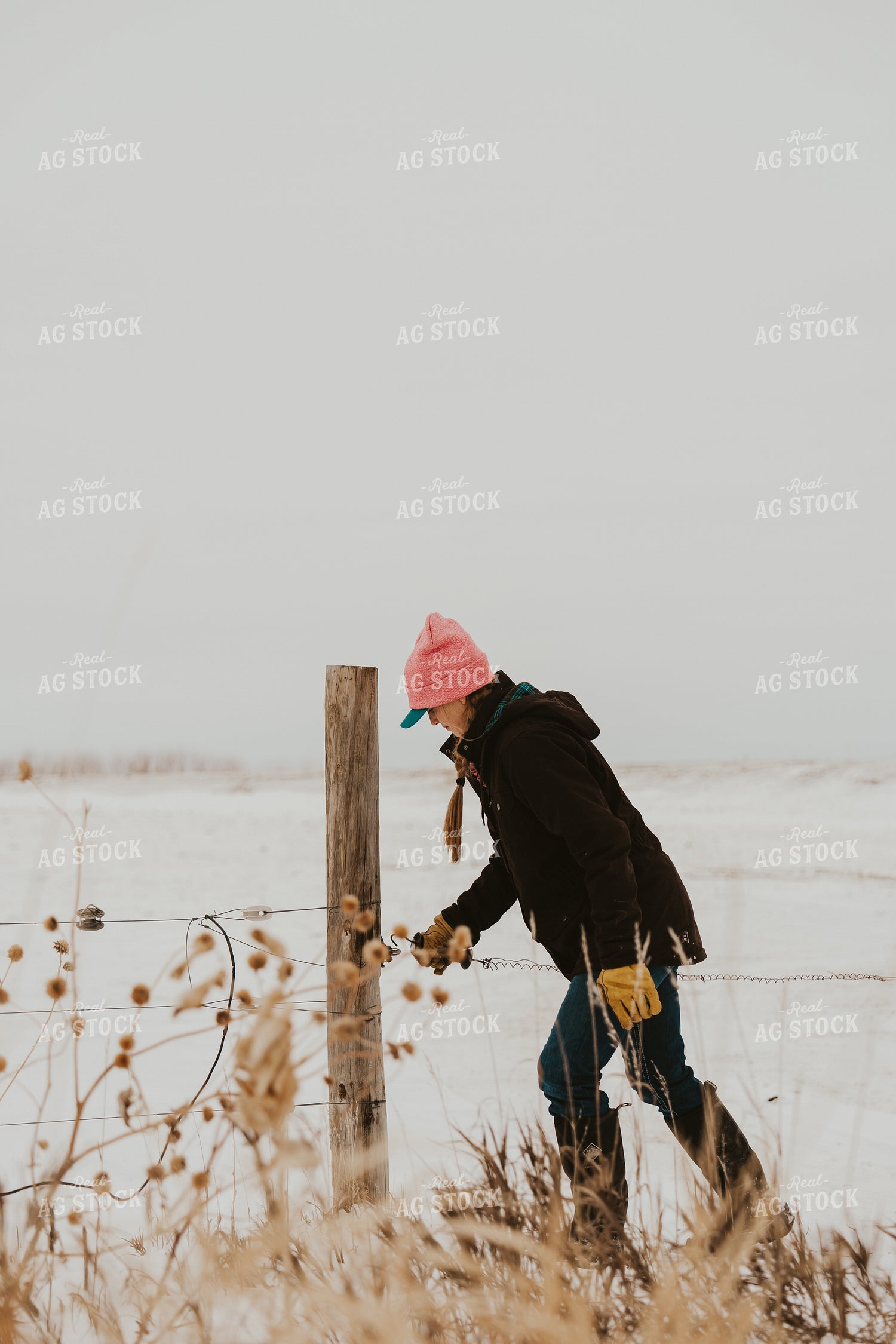 Female Rancher Working on Fence 61174