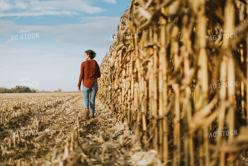 Female Farmer Walking in Cornfield 8515