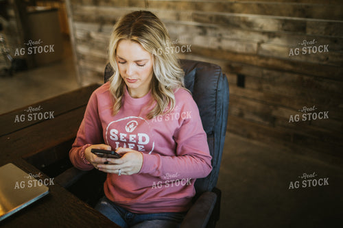 Woman Working at Computer Texting on Phone 5311