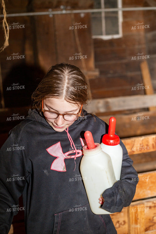 Farm Kid with Calf Bottles 155573