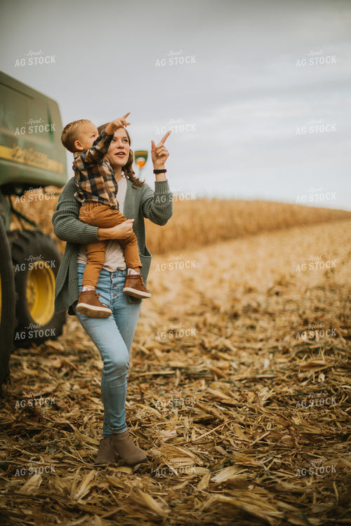 Farmer and Farm Kid in Field 6655
