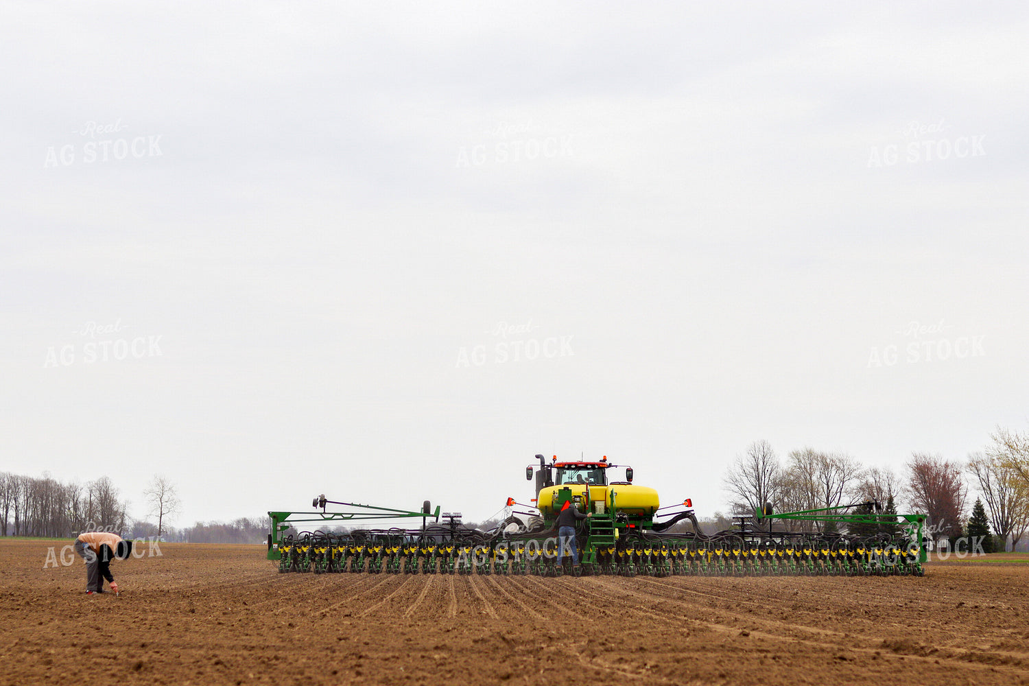 Farmers in Field with Planter 109005